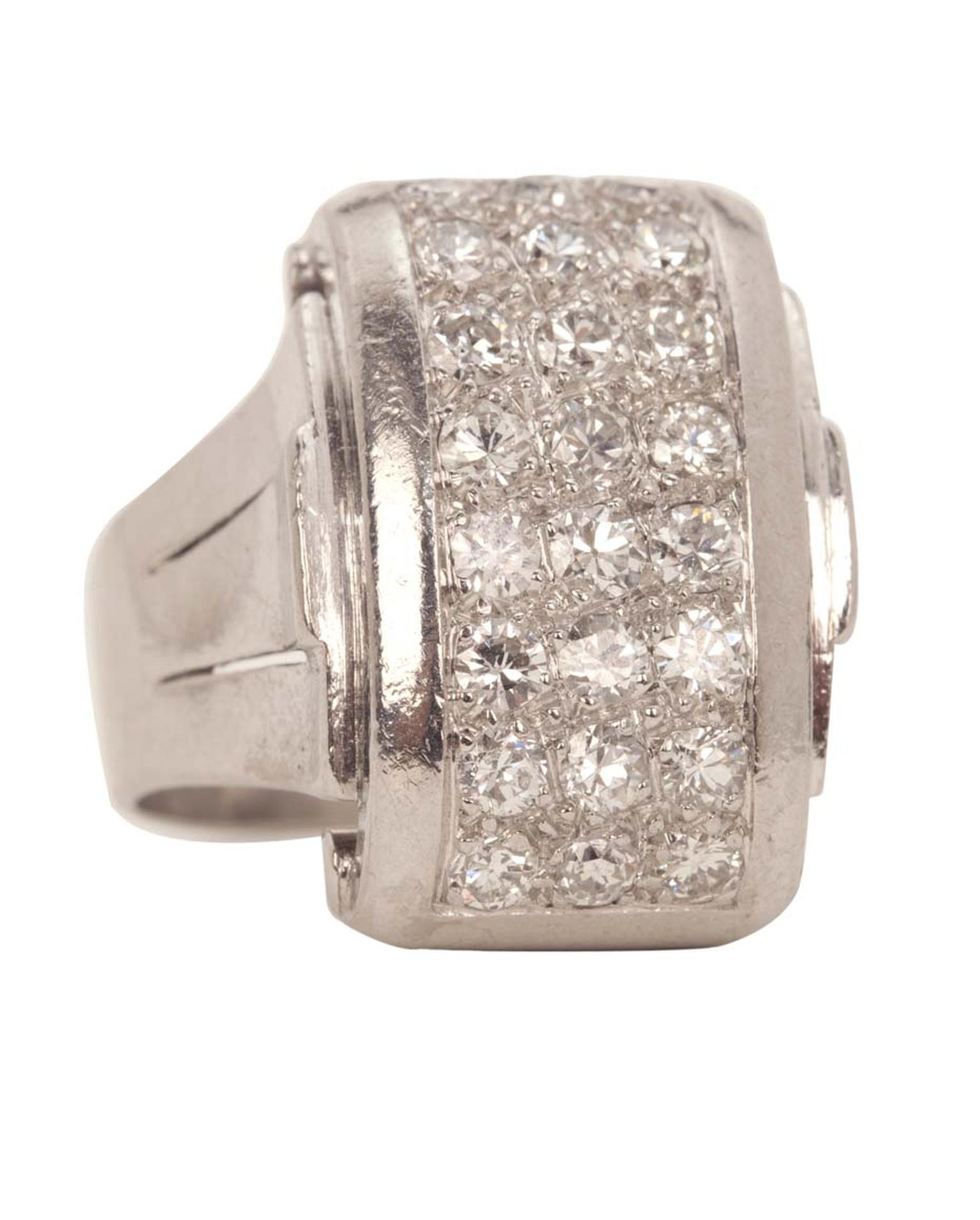 René Boivin Art Deco white gold and platinum ring circa 1935 in an odeonesque style with pavé-set diamonds.