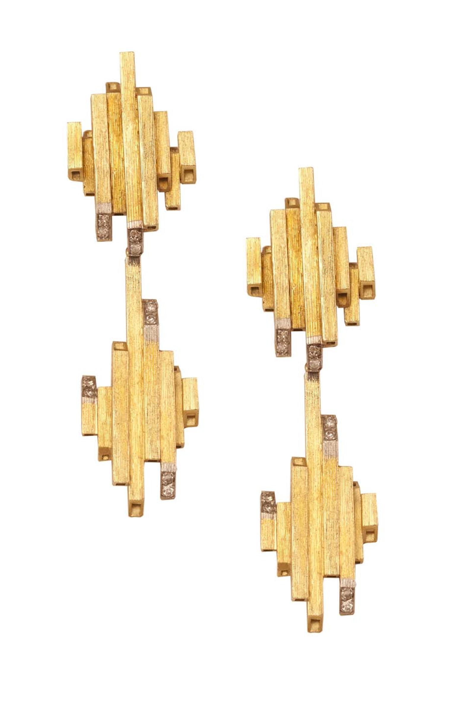 Andrew Grima detachable ear pendants featuring brilliant-cut diamonds.