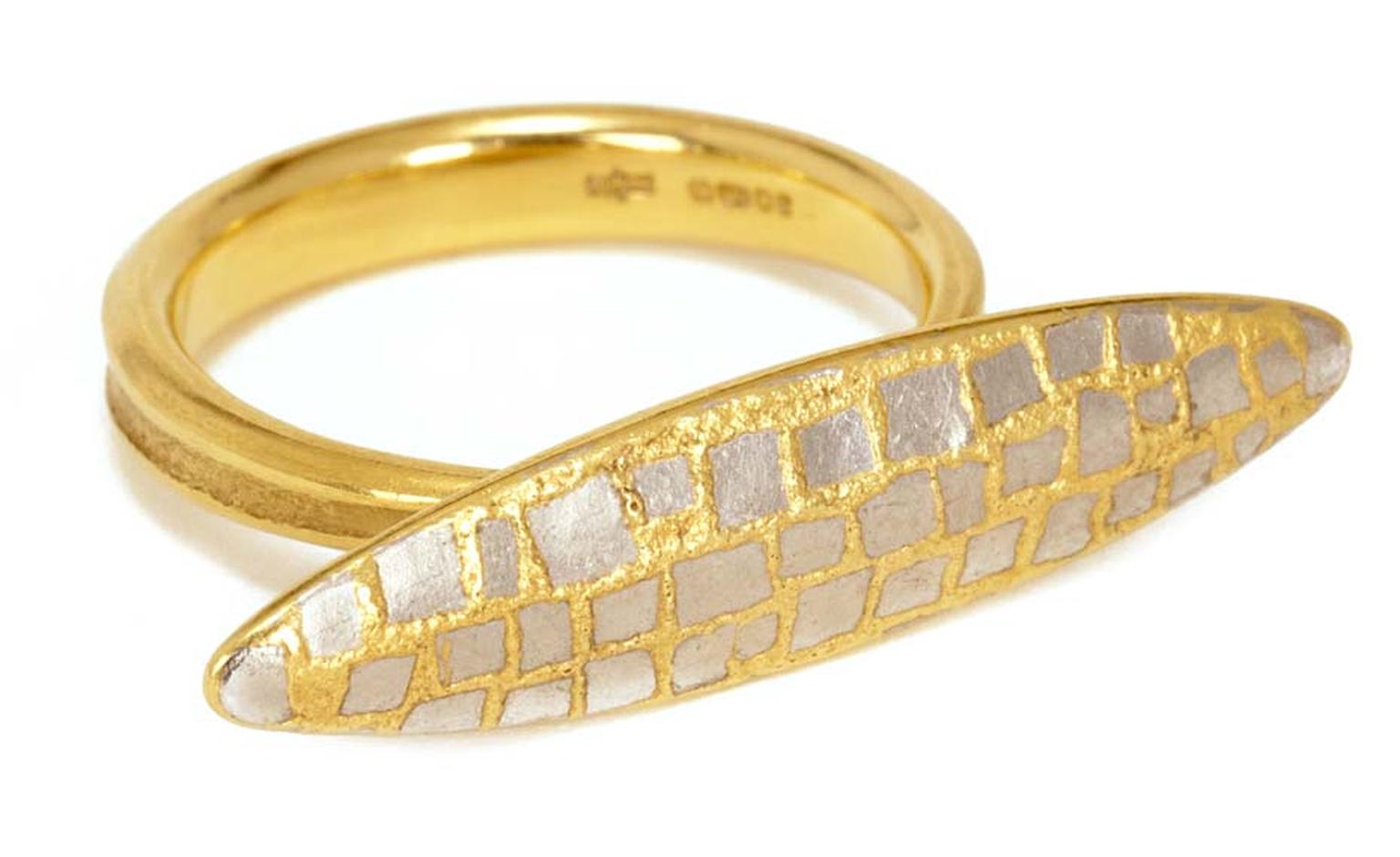 Jacqueline Mina, OBE yellow gold ring with a navette-shaped motif featuring a platinum and yellow gold tessarae design.