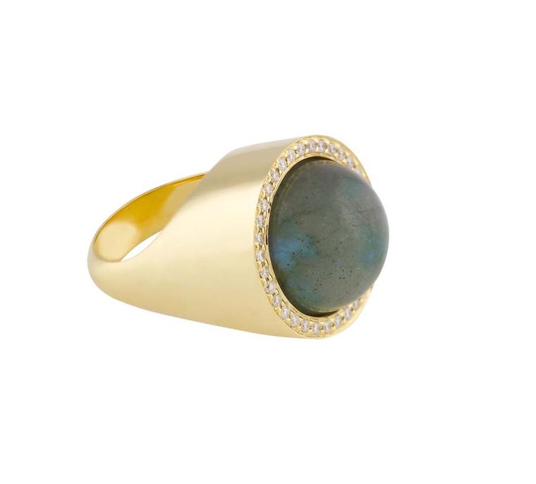 Noor Fares Aurora ring featuring a 20.15ct labradorite set in a rotating yellow gold setting with diamonds.