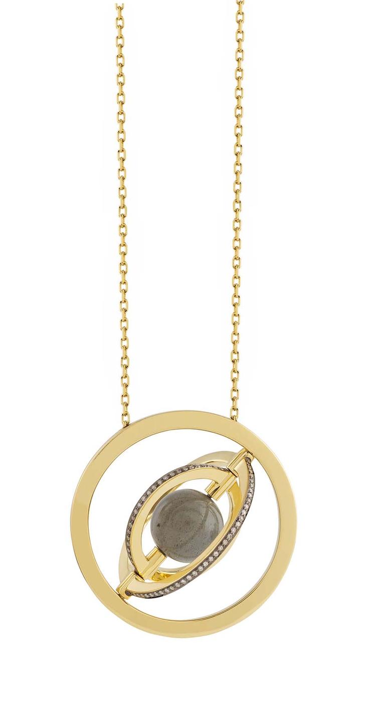 Noor Fares Urania pendant with a centre 7.17ct labradorite sphere surrounded by a rotating setting of three rings of yellow gold and diamonds.