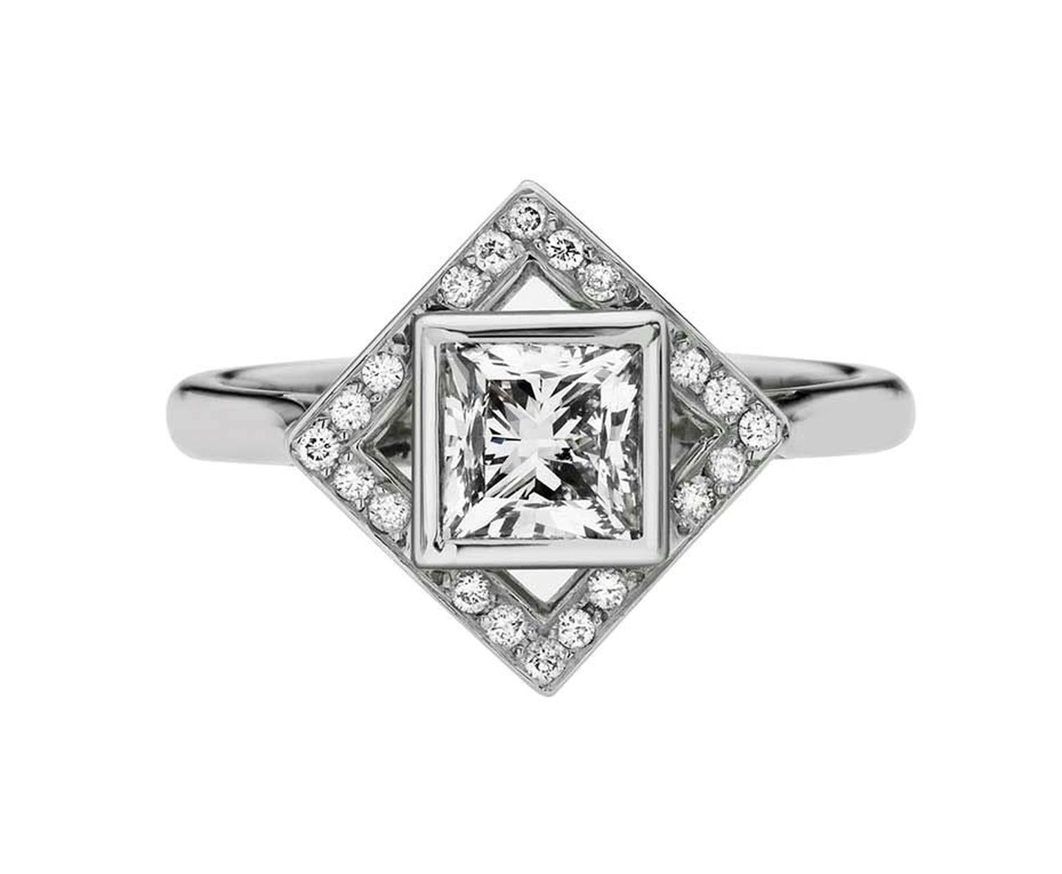 Ethan and Co. princess-cut diamond solitaire ring surrounded by a square of diamond pavé tilted at a different angle to the central stone.