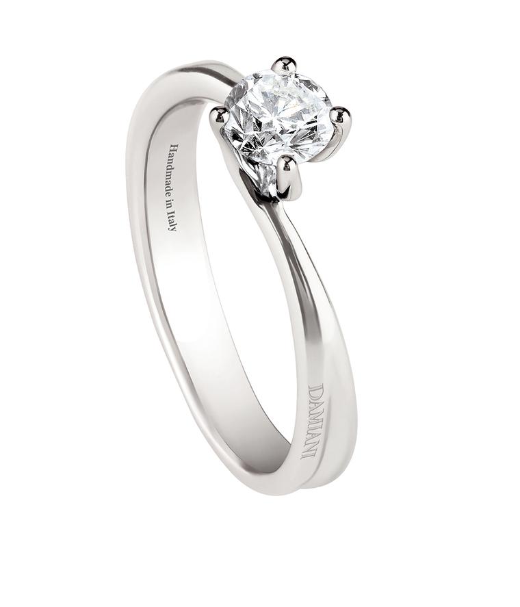Damiani Beauty collection brilliant-cut solitaire engagement ring with a curved band setting.