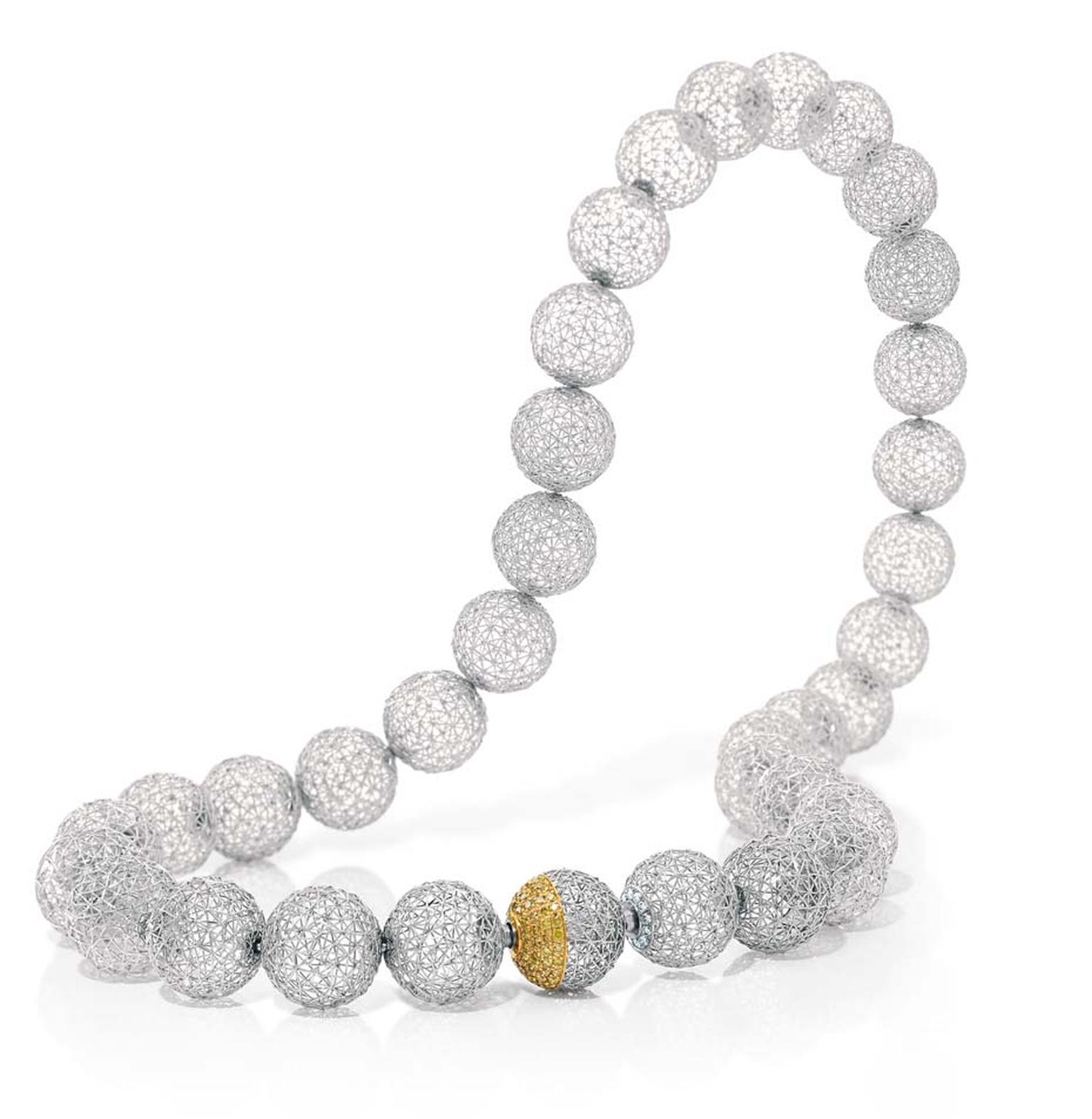 Tom Rucker's Geo Geosphere necklace was assembled from 26 laser-welded Platinum 950 balls, connected using 3D joints.