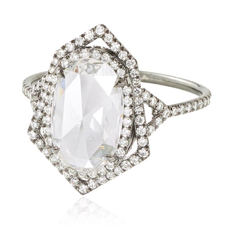 Monique Péan Mineraux collection diamond engagement ring in recycled oxidised platinum, set with an antique white oval rose-cut diamond and diamond pavé.