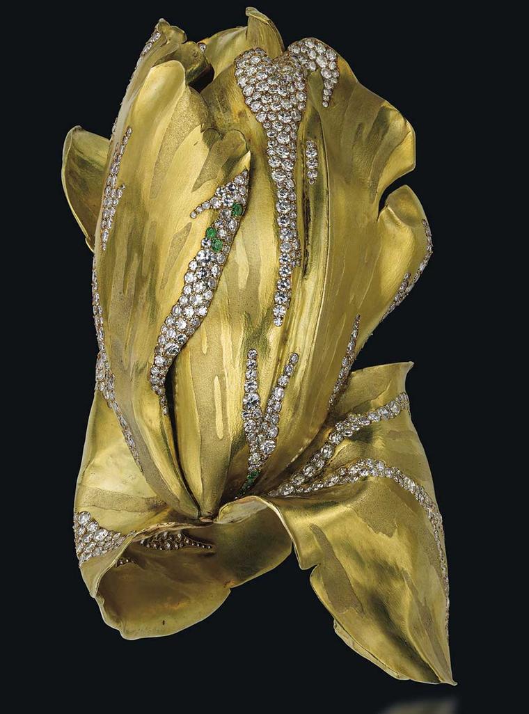 A gold, diamond and green garnet Parrot Tulip bangle by JAR achieved $3,595,853 at Christie's Geneva Magnificent Jewels auction in November 2014 - the second highest price achieved for one of the jeweller's creations.