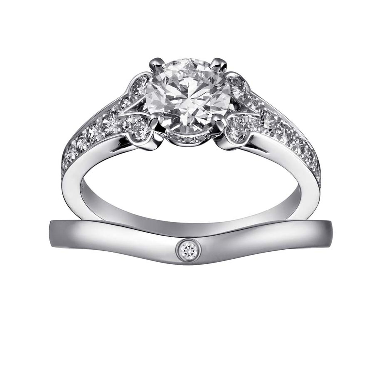 Cartier Solitaire Ballerine solitaire diamond engagement ring and band.