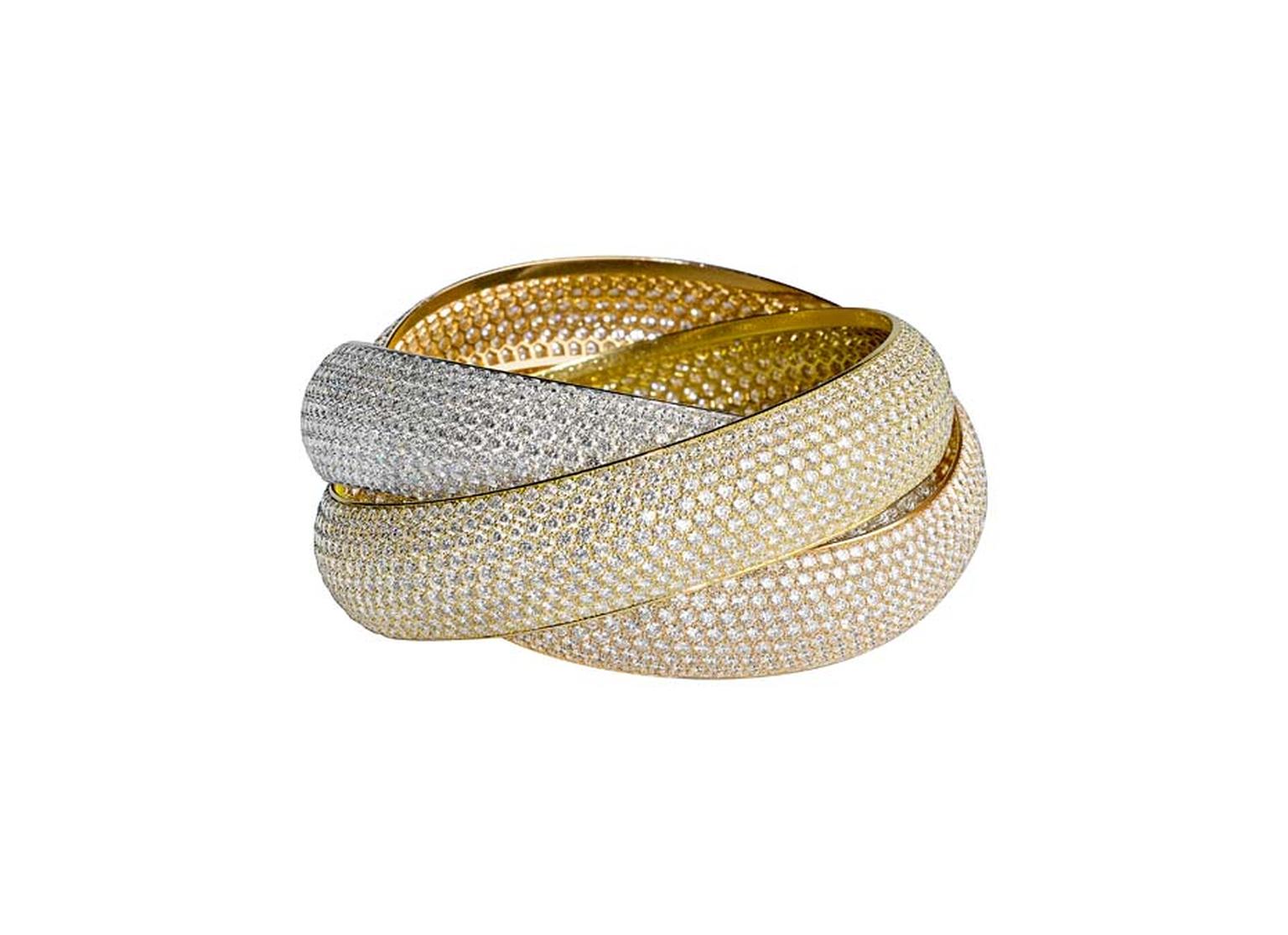 Cartier XXL Trinity bracelet in white, yellow and rose gold, set with 2,727 diamonds.