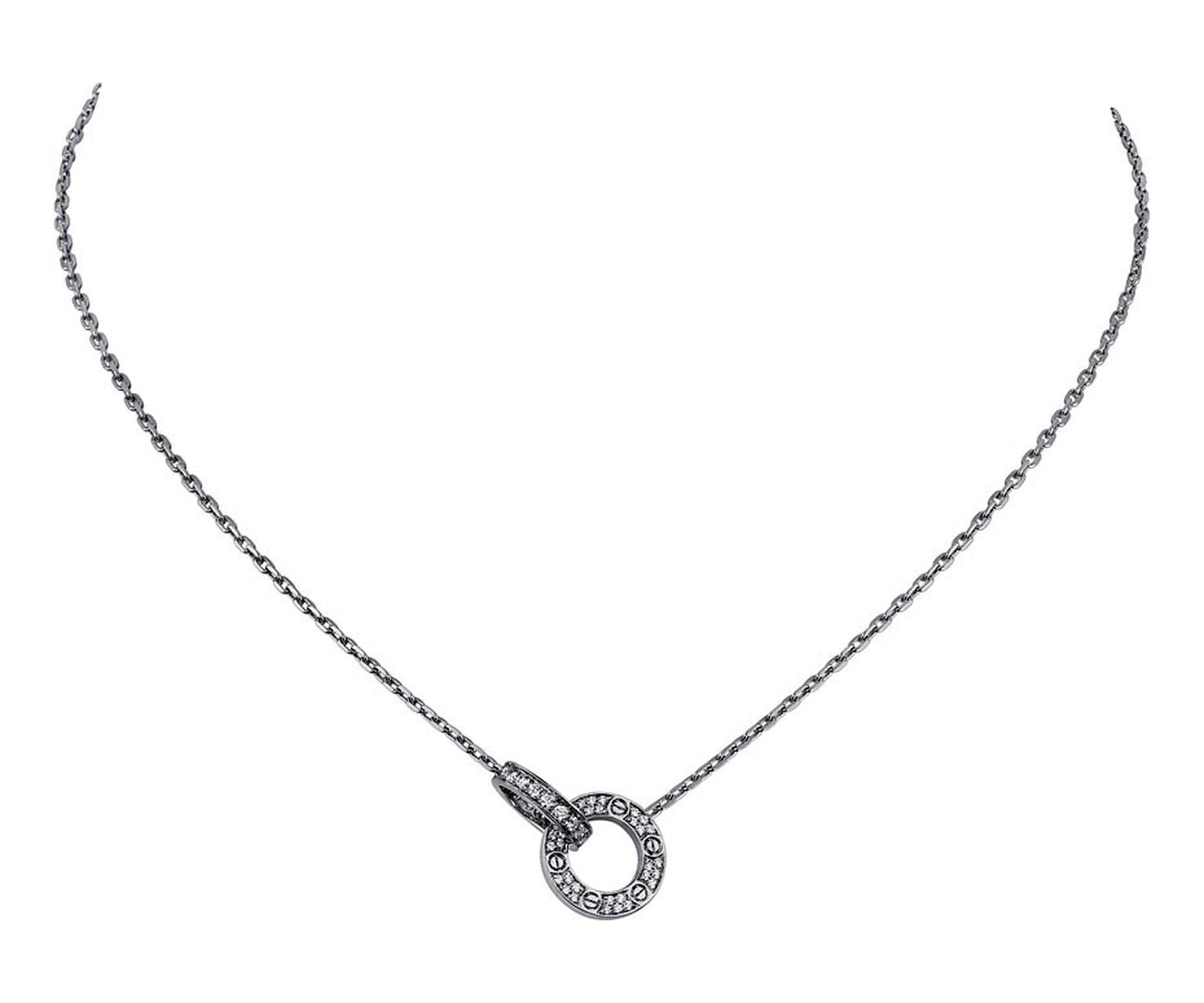Rich in symbolic appeal is the Cartier Love necklace with interlocking diamond-set rings.
