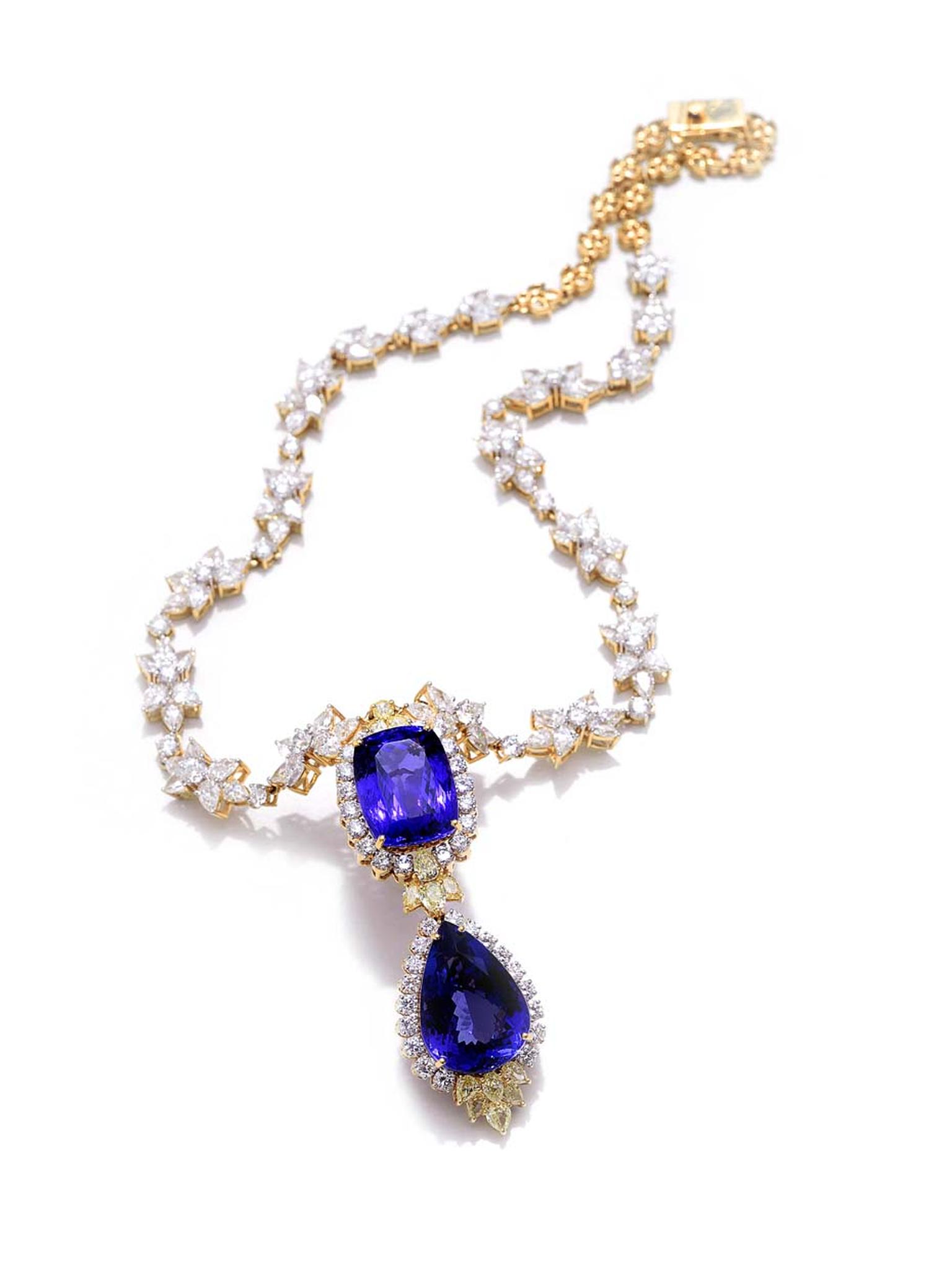 Farah Khan classic diamond necklace with cushion-shaped and pear-shaped tanzanite accented by yellow sapphires set in yellow gold.