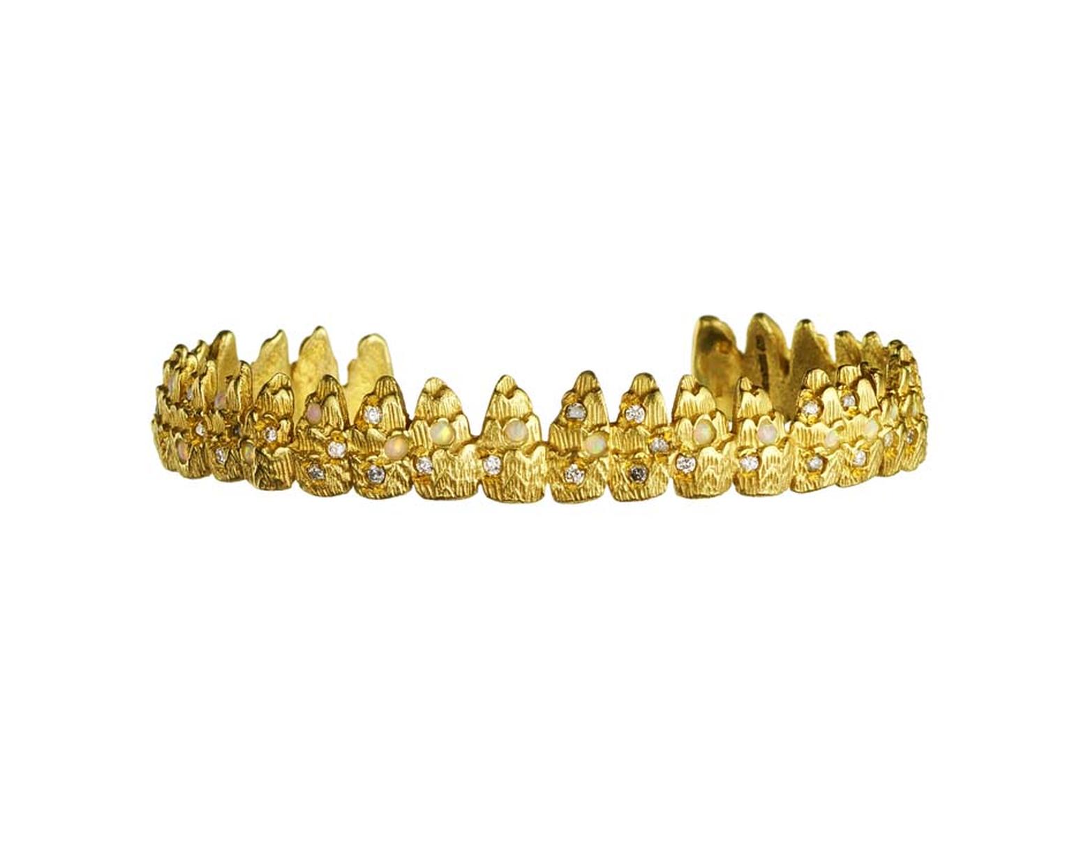 Carolina Bucci textured gold bracelet with diamonds and opals.