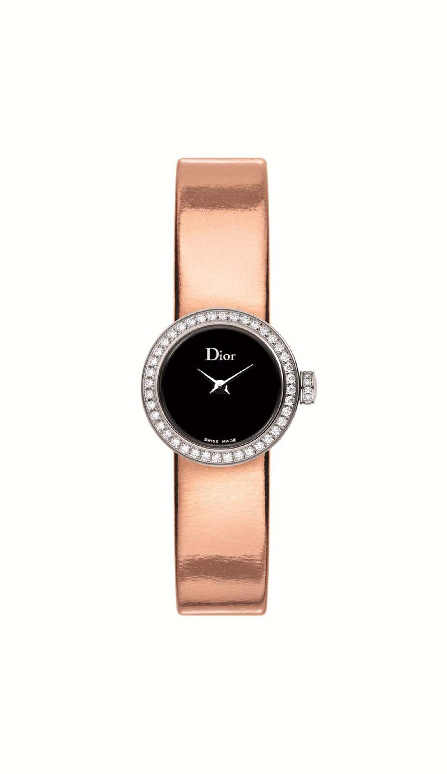 This La Mini D de Dior watch measures just 19mm across. With an inky black mother-of-pearl dial set alight with diamonds on the bezel and crown, a sumptuous metallic leather strap adds the finishing touch (£2,900).