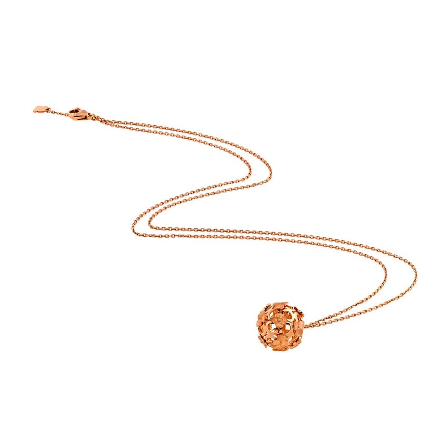 The Chaumet Hortensia necklace hangs fashionably low on a long chain with interlaced rose gold flowers fashioned into a ball, inspired by the round shape of the hydrangea flower (£2,030).