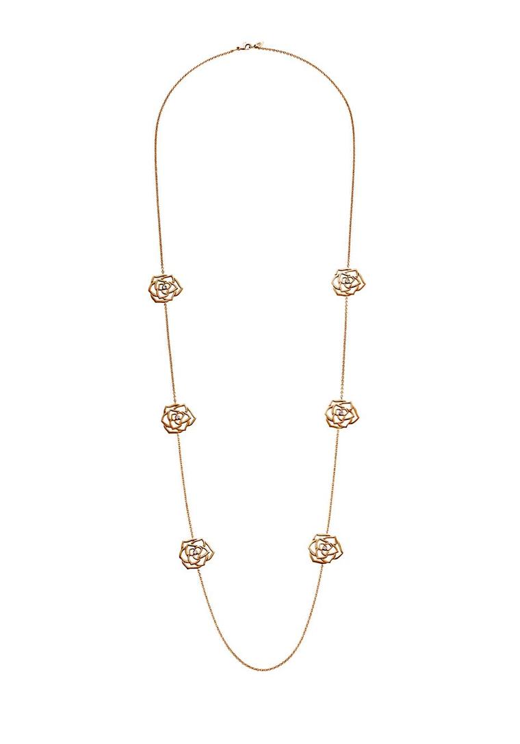 Piaget Rose necklace in rose gold. Measuring over a metre in length, it features six symmetrically placed roses with a diamond nestling in the centre of each (£6,600).
