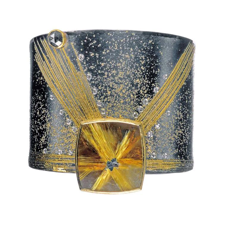Atelier Zobel bracelet in gold and silver with rutilated quartz, black diamonds and champagne diamonds.