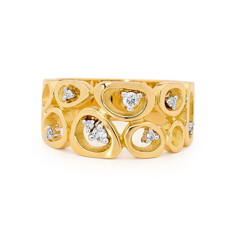 Linneys ring in yellow and white gold with diamonds.