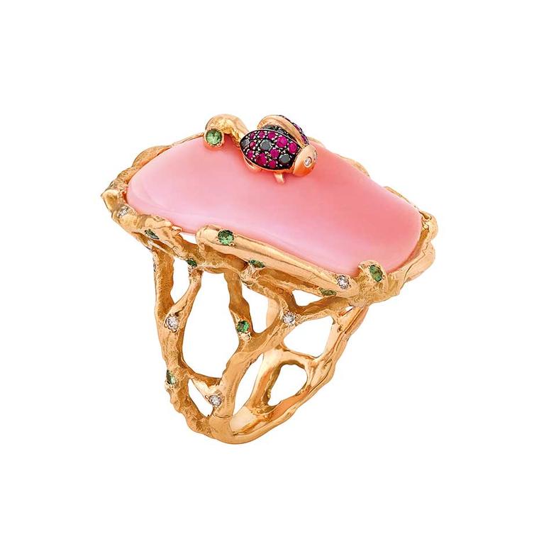 Christina Debs ring set with a conch shell and white diamonds, topped with a gem-set pink gold ladybird, from the Mother Nature collection.