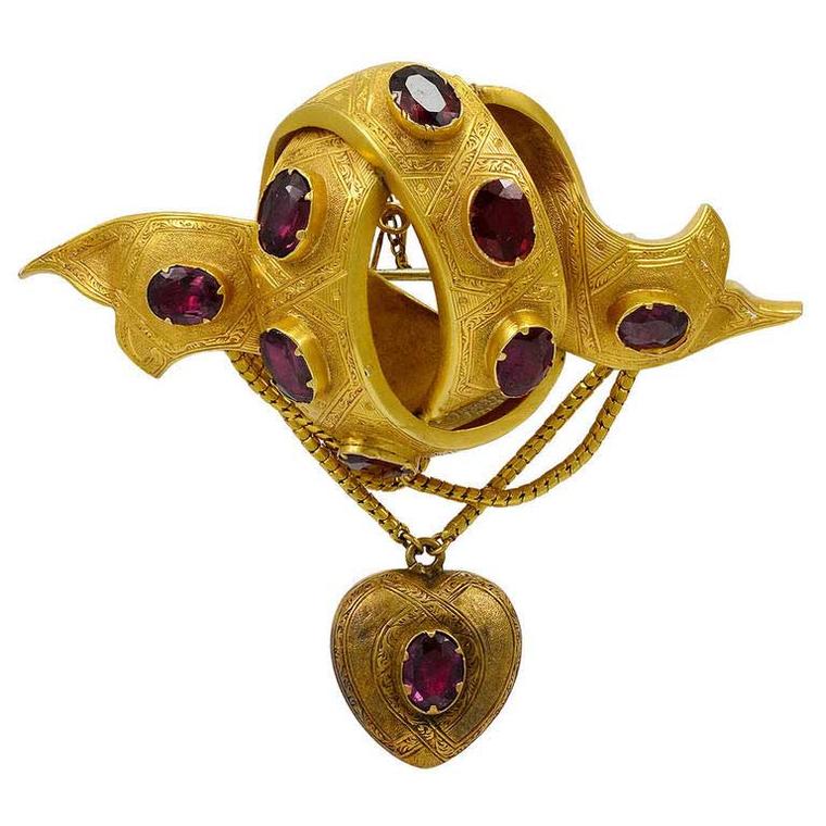 Victorian almandine garnet and gold brooch. Available from 1stdibs.com.