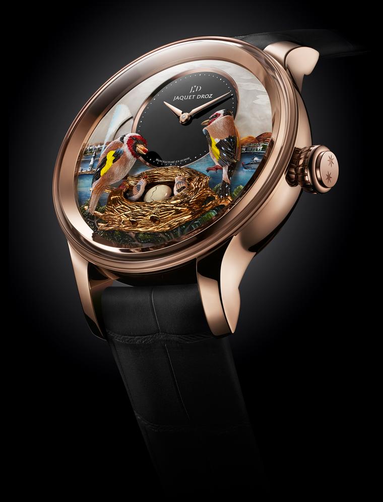 The Bird Repeater Geneva features miniature painting on the white mother-of-pearl dial and reproduces landmarks from Geneva, such as the Jet d'Eau fountain in Lake Léman, the lighthouse and the silhouette of the mountains.