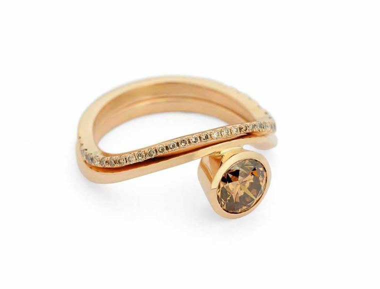 Rose gold engagement ring by McCaul Goldsmiths with a central cognac diamond and matching cognac diamond wedding band.