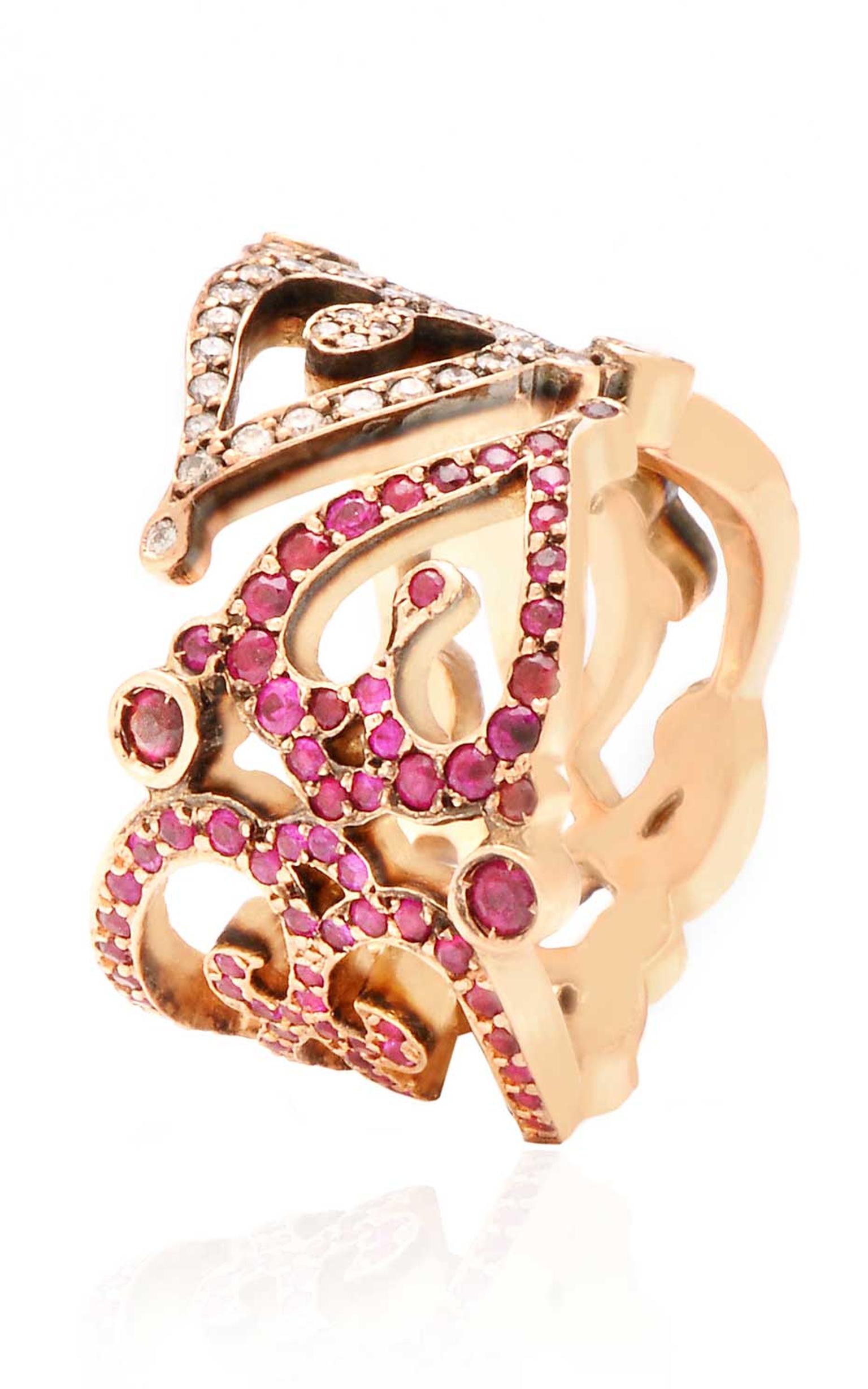 Sabine G Love ring in pink gold with white diamonds and rubies.
