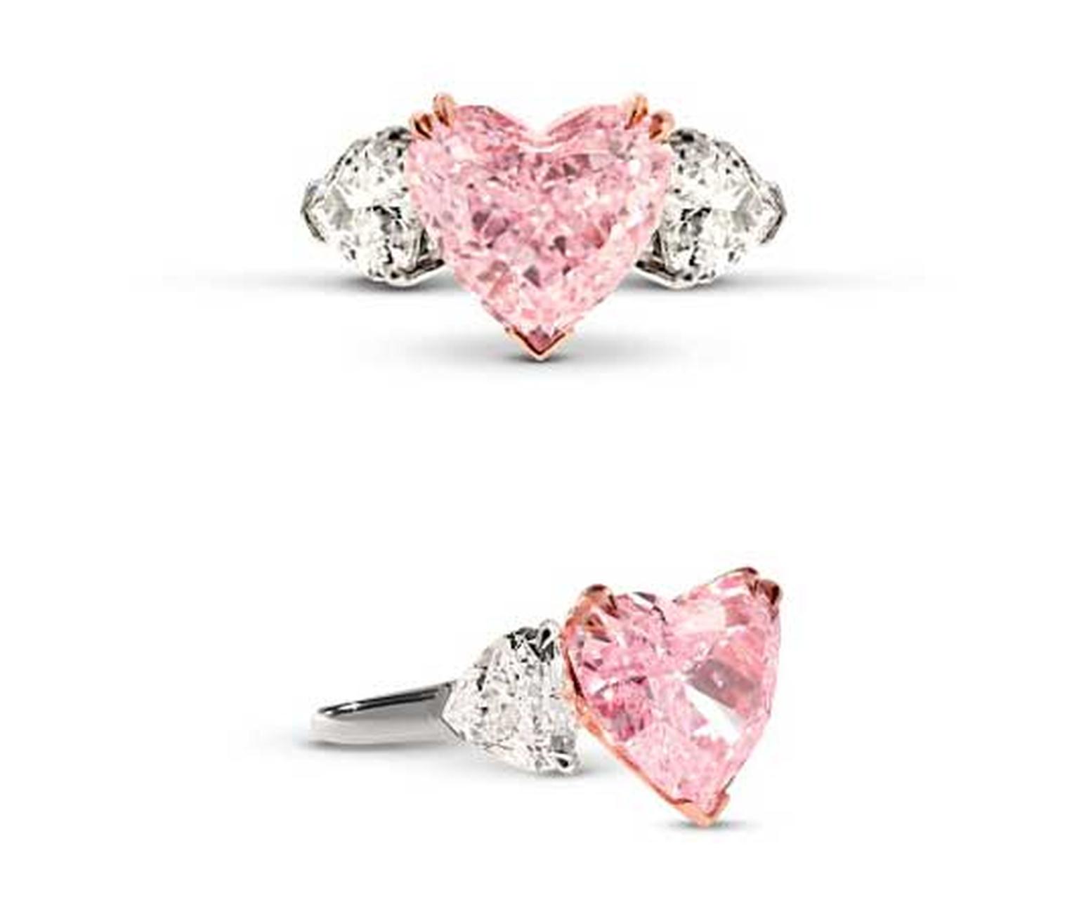 Star Diamond pink diamond engagement ring, set with a 5.32ct heart-shaped Intense pink diamond, flanked on either side by white diamonds.
