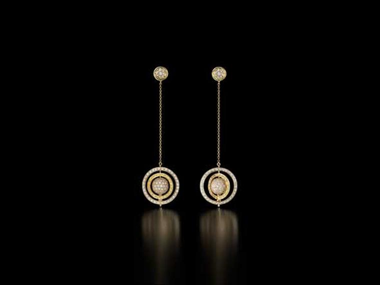 The Spinning Orb earrings in gold with yellow and white pavé diamonds from Liv Ballard.
