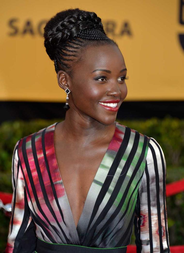 Lupita Nyong’o, pictured at the 2015 SAG Awards in LA, wearing Fred Leighton jewelry, including these stunning Pyramid pendant earrings in black jade, rock crystal and diamond.