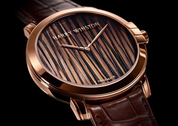 Harry Winston Feathers Automatic watch is presented in a 42mm slim rose gold case with a transparent caseback to reveal the refined finishes of the automatic movement.