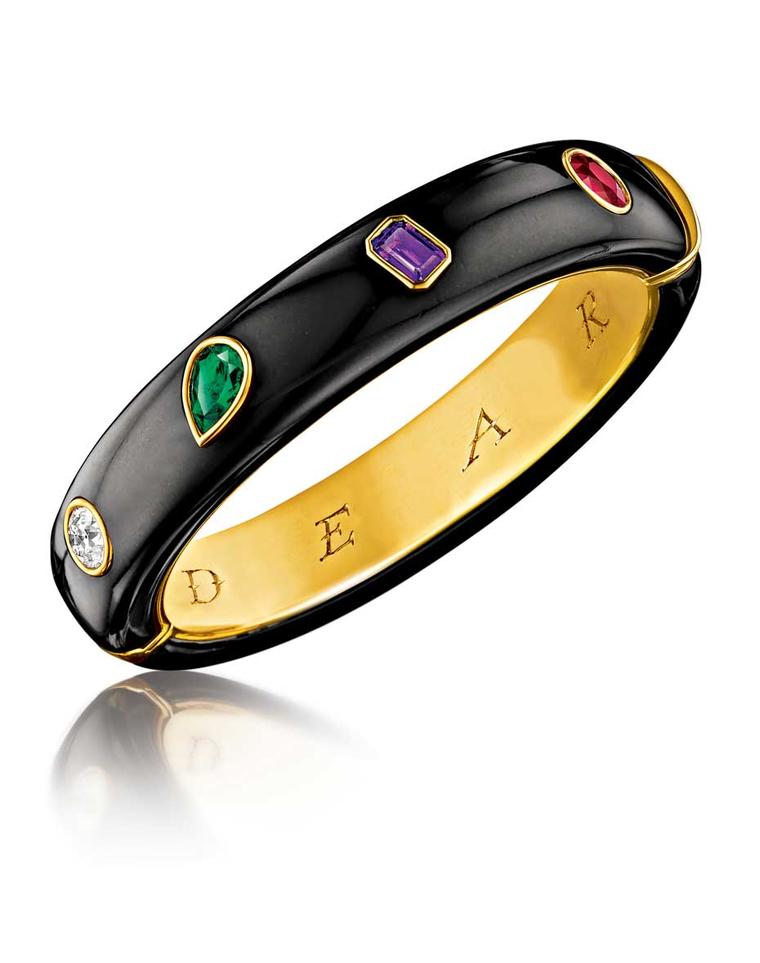 This Victorian-inspired Verdura bangle spells out the word Dear in diamond, emerald, amethyst and ruby.
