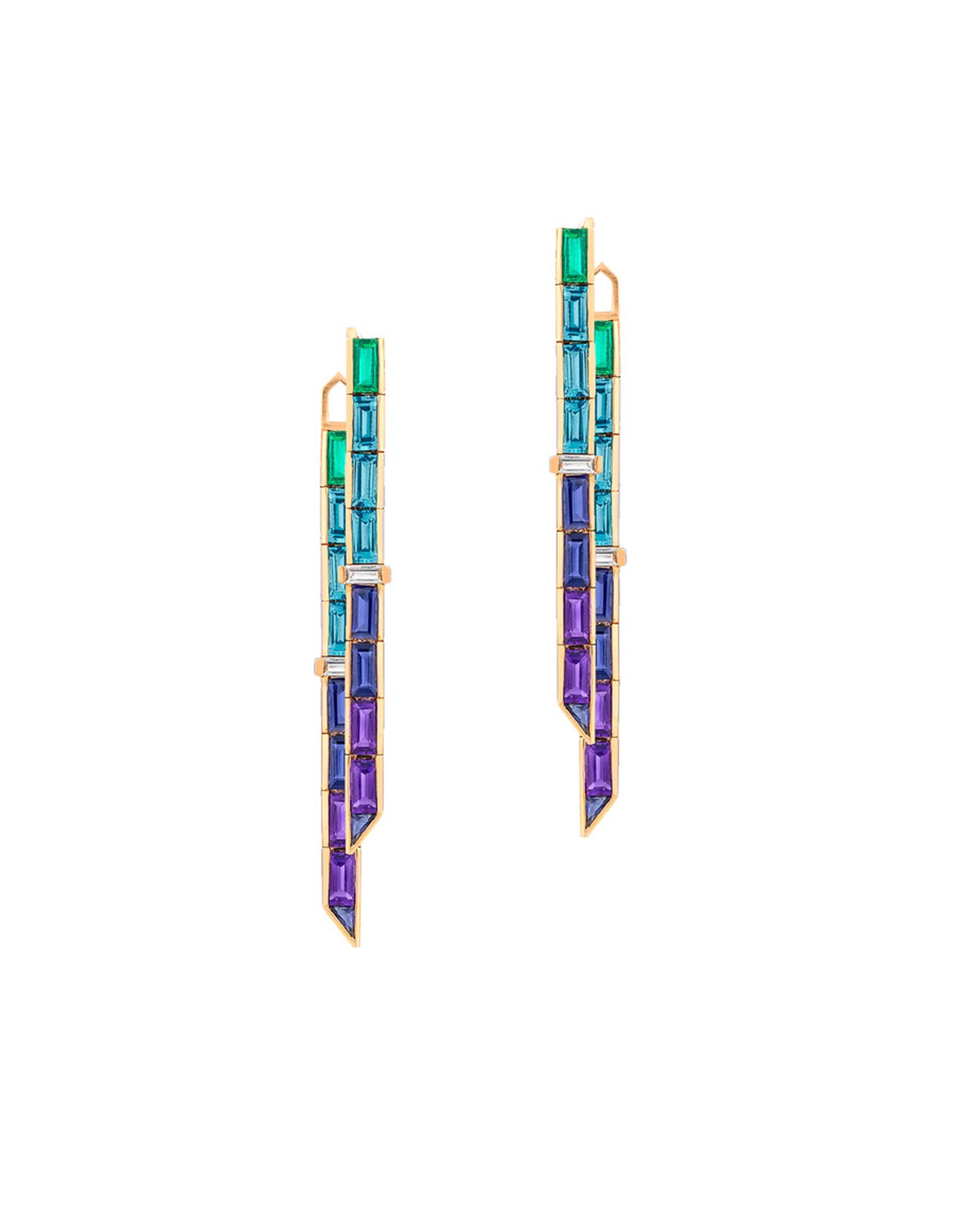 A combination of short and long drop earrings in rose gold from Tomasz Donocik's Electric Night collection.