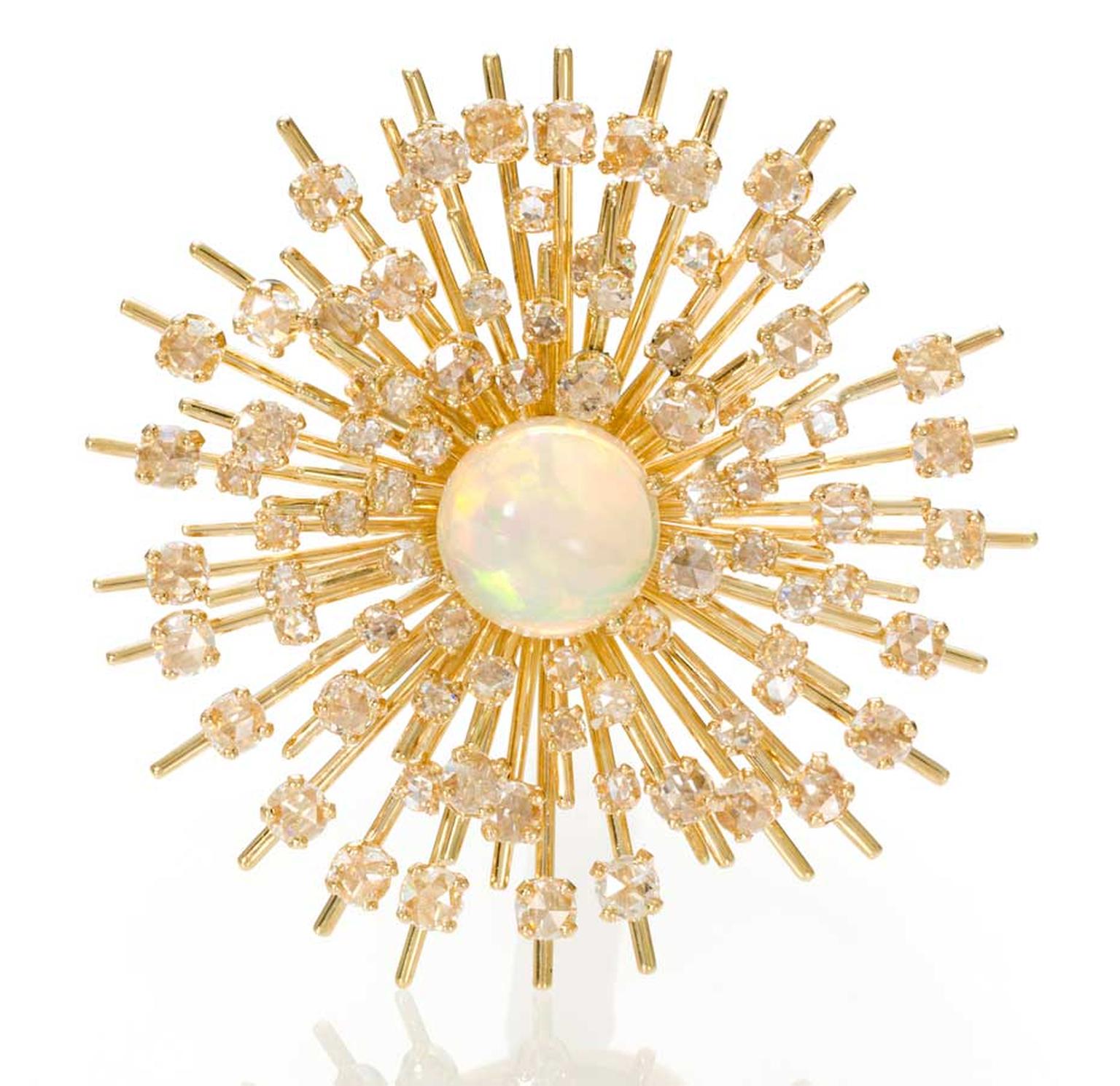 This stunning Starburst opal and diamond ring by Maiyet is set with a circular cabochon opal within a rose-cut diamond and gold starburst mount.