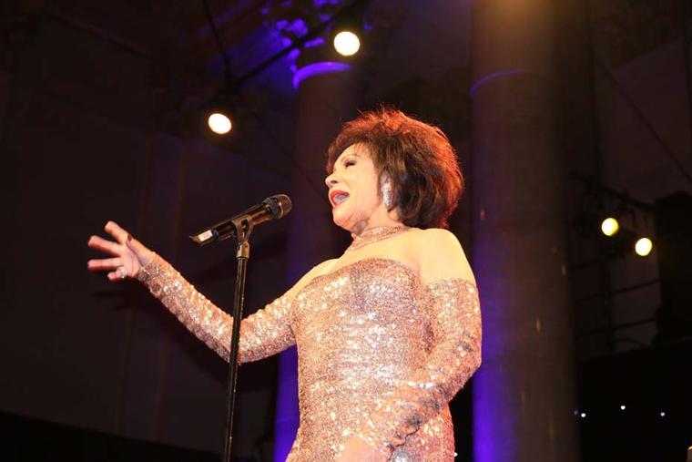 The amfAR Gala also included a special performance from Dame Shirley Bassey, who accessorised her stunning gold dress with a duo of Harry Winston diamond jewellery, as she took to the stage to sing "Diamonds are Forever". Bassey wore a set of Winston Clus