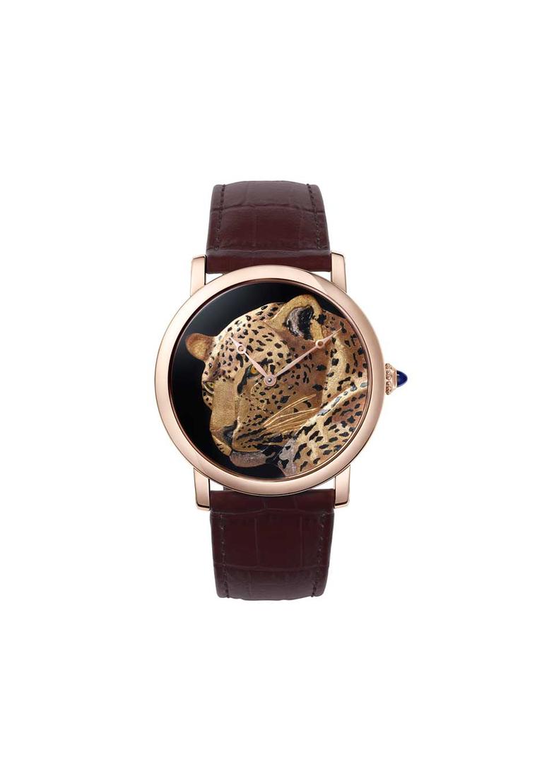 Rotonde de Cartier damascened panther watch showcases the art of inlaying precious metals onto a metal surface that is responsible for the almost life-like volumes of the panther. (Nils Hermann@Cartier)