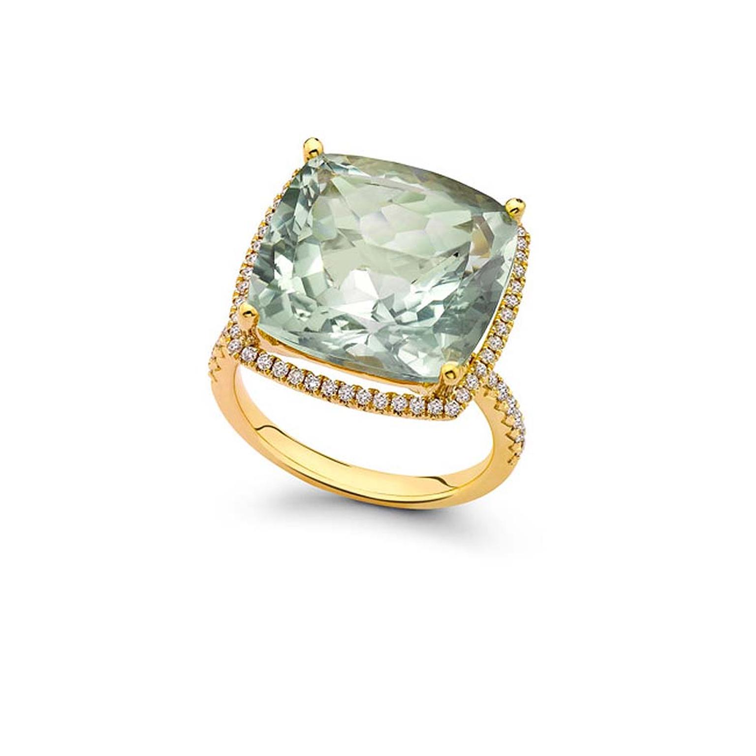 Kiki McDonough Grace green amethyst cushion ring in yellow gold features a cushion-cut pale green amethyst  surrounded by pavé-set diamonds. £2900.
