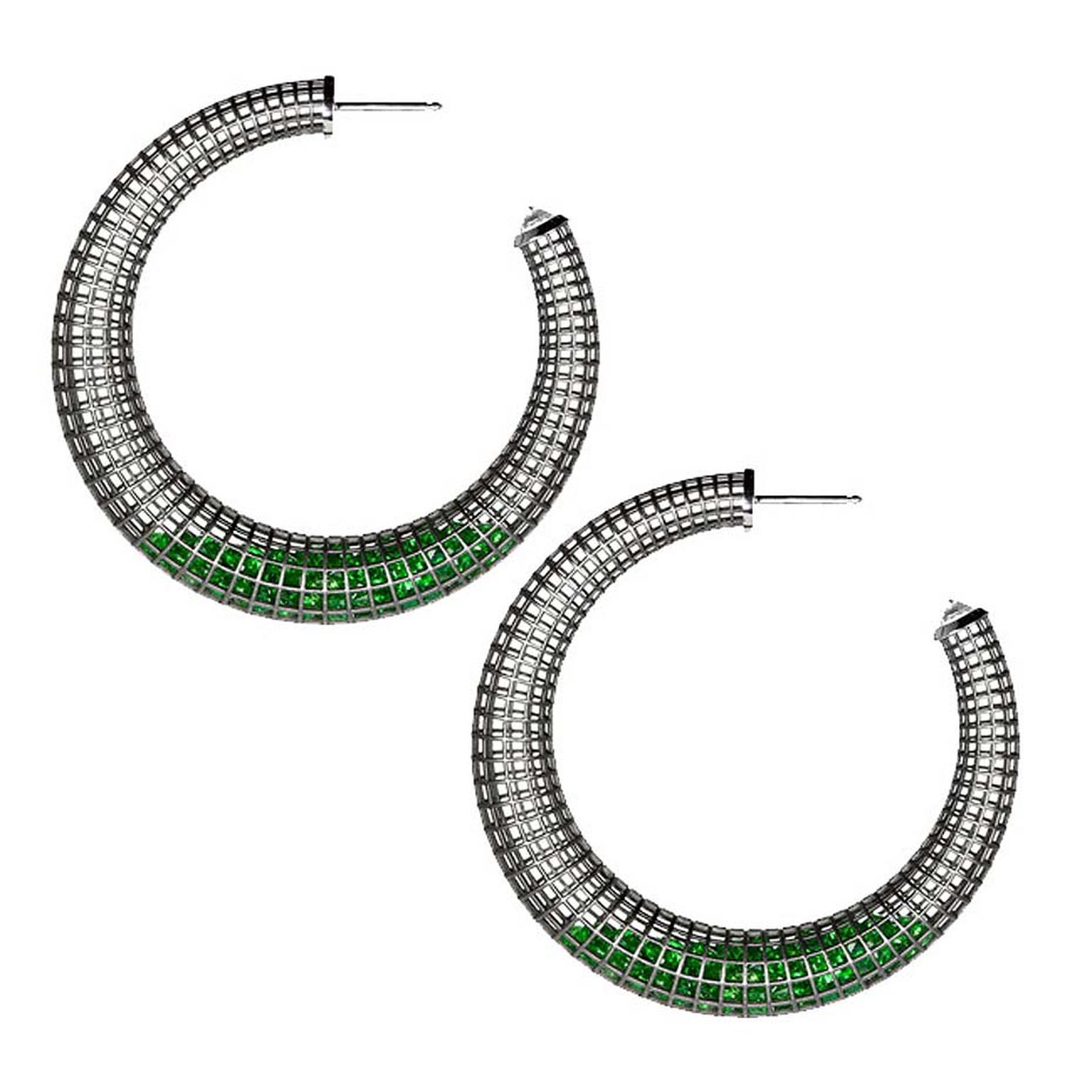 Roule & Co Shaker Crescent hoop earrings in blackened white gold, with floating green tsavorites. $15,500.