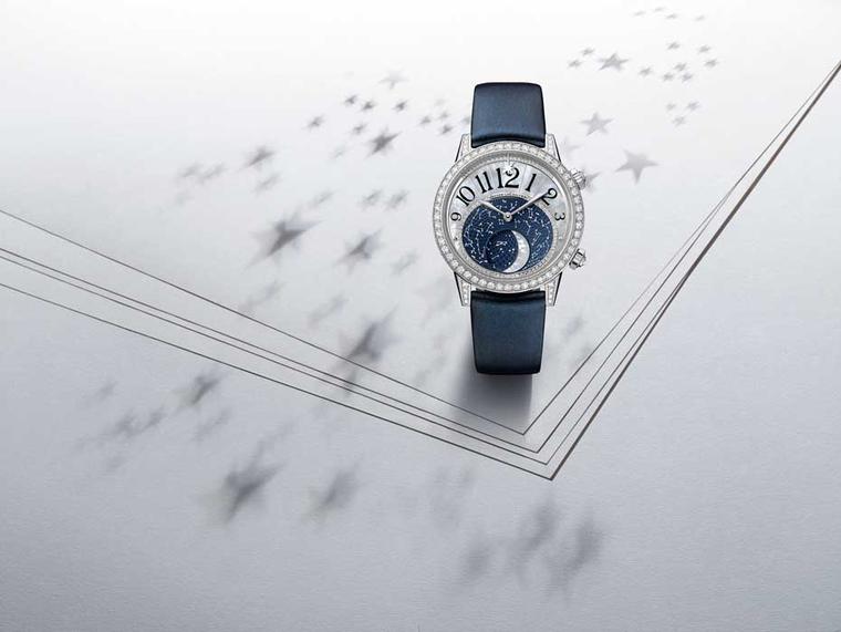 Jaeger-LeCoultre Rendez-Vous Moon is presented in a white gold case in either a 36mm or 39mm diameter. The 36mm case is lit up with 166 brilliant-cut diamonds on the bezel, the 39mm version features 208 brilliant-cut diamonds and comes on a navy blue sati