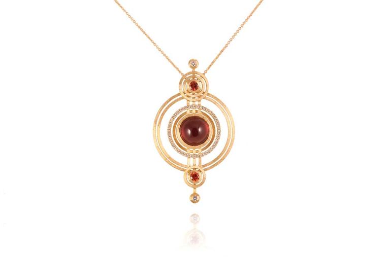 Shimell & Madden necklace from the Orb collection in yellow gold with deep red cabochon garnets, orange sapphires and diamonds.
