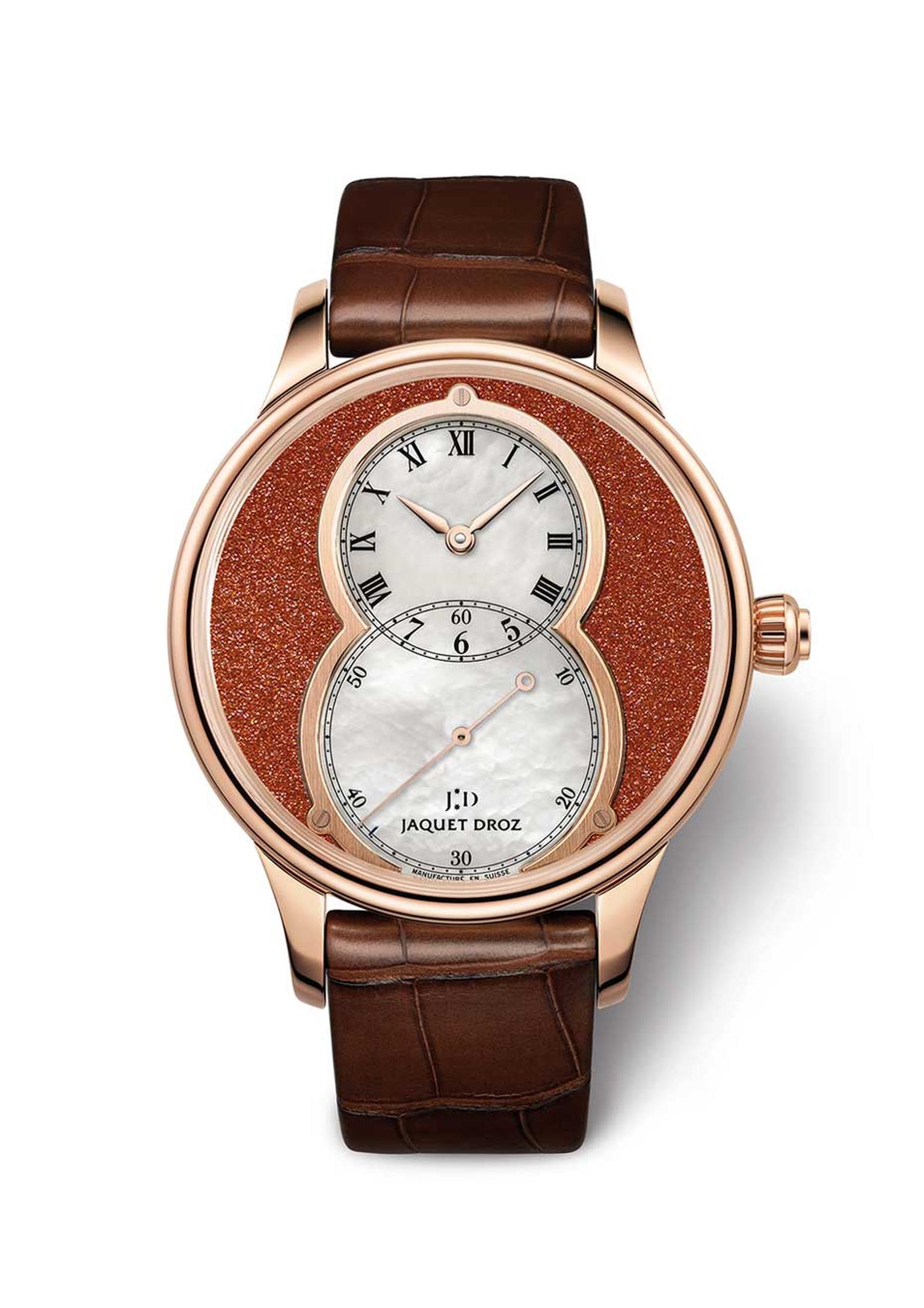 Jaquet Droz Grande Seconde Sunstone watch is characterised by its overlapping dials forming a figure eight. The outer Sunstone dial is offset by a white mother-of-pearl subdial, which indicates the small seconds. Presented in a 39mm rose gold case, this w