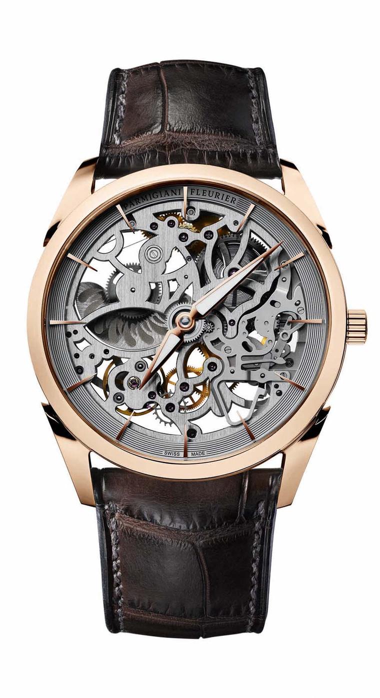 Parmigiani Tonda 1950 Squelette men's watch is a subtle, more sober take on skeletonisation with an ultra-thin movement just 2.6mm thick. Pictured here, the 39 mm rose gold skeleton watch with a tan Hermès strap.