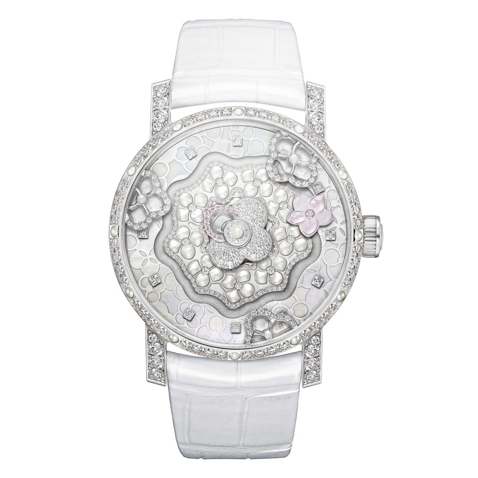 The new Chaumet Hortensia Creative Complication ladies' watch houses an exclusive Swiss automatic movement, and involved the work of countless artisans to sculpt the mother-of-pearl dial, engrave the 41mm white gold case, and set the diamonds.