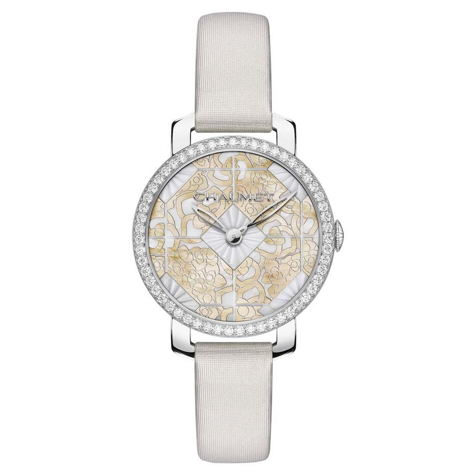 Chaumet Hortensia ladies' watch with a 31mm geometric dial has been delicately engraved in gold mother-of-pearl and set into the white mother-of-pearl hexagonal shapes in the centre.