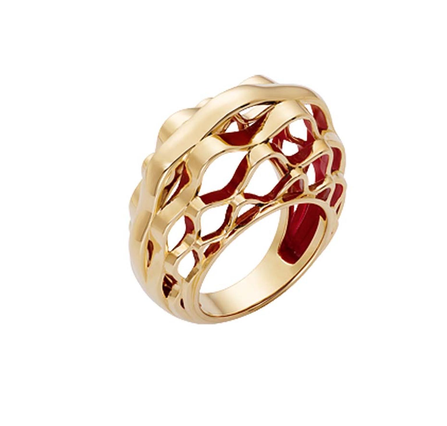 The metalwork of the glass dome of the Grand Palais is interpreted by Cartier in this dramatic ring that resembles golden basketwork - one of the new Paris Nouvelle Vague jewels.