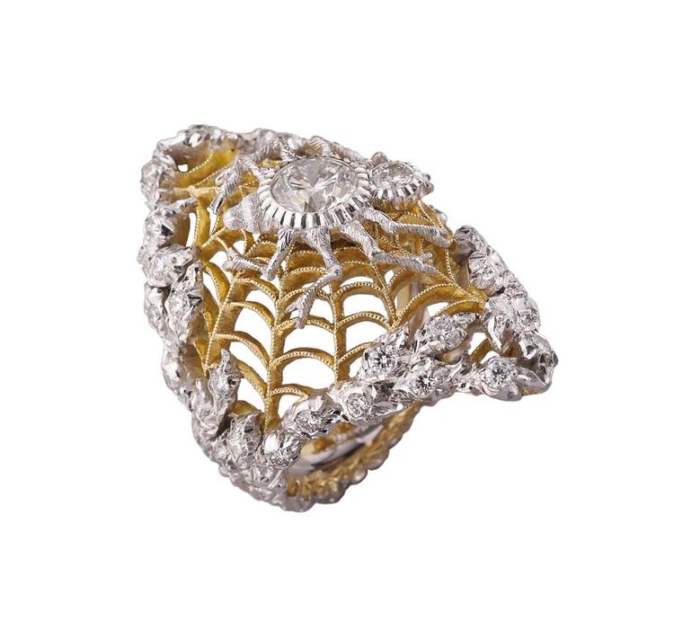 Buccellati's honeycomb technique fits perfectly with the interpretation of Larionov's "The Spider's Web". The scalloped borders of the web are in white gold, set with brilliant-cut diamonds, providing the perfect setting for the mounted spider with its hi