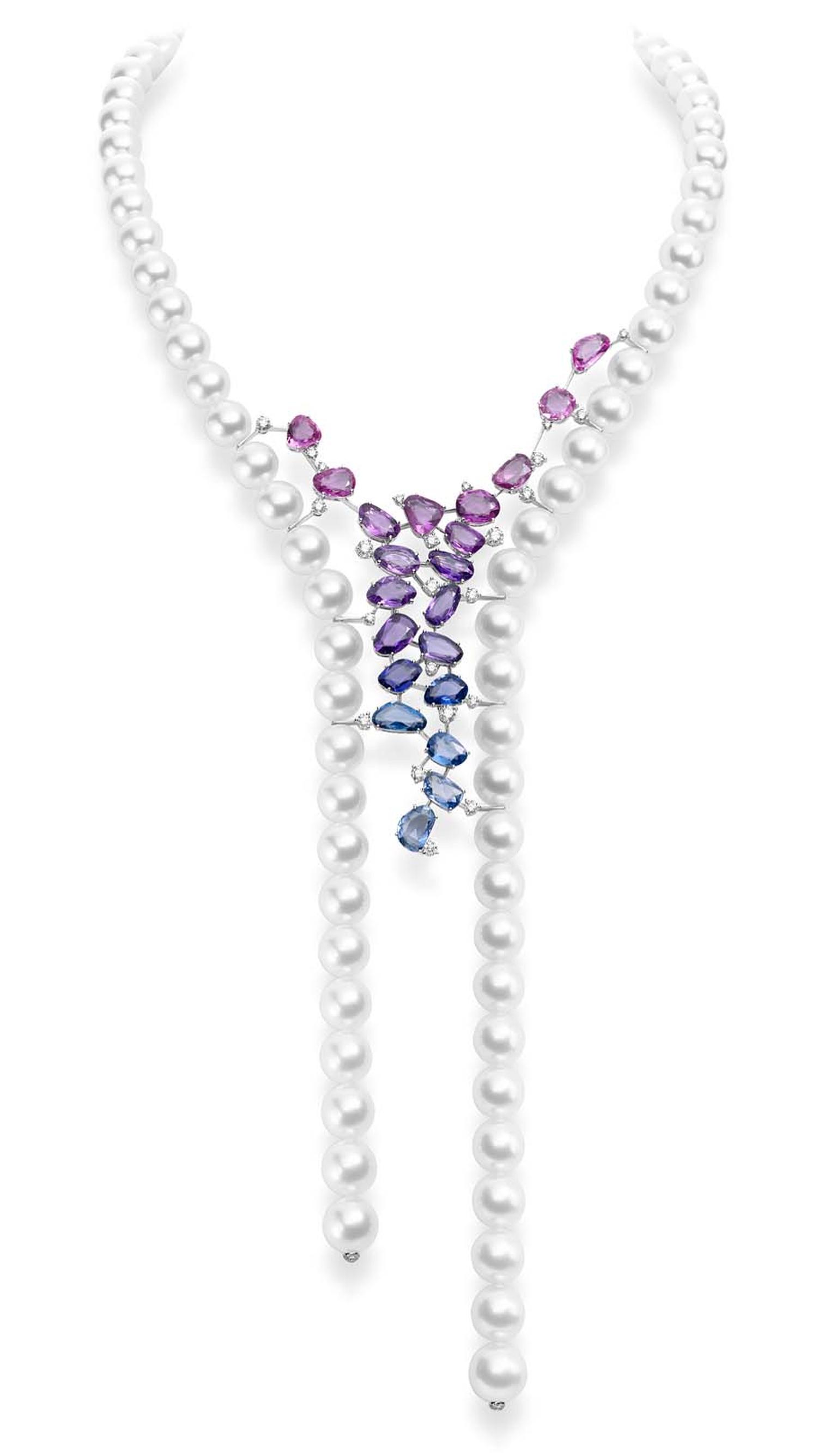 Mikimoto's Sunset necklace features jewels arranged in a unique mosaic of vibrant pink, purple and blue. White cultured South Sea pearls surround a delicate cascade of pink, purple and blue sapphires and diamonds set in white gold.