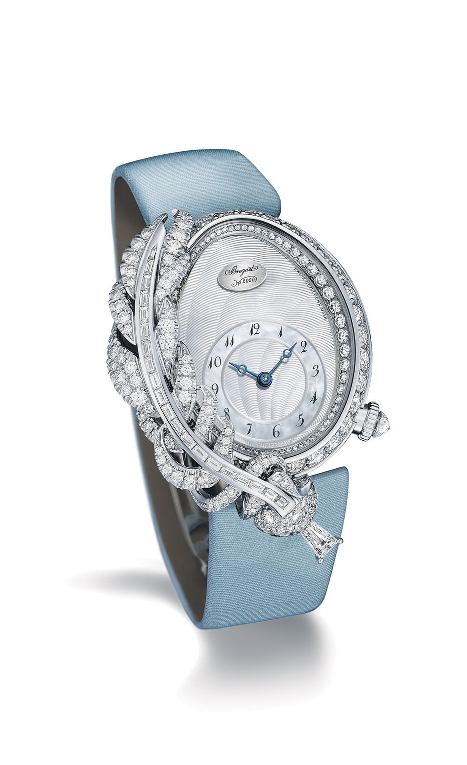 Breguet watches Rêve de Plume high jewellery timepiece draws inspiration from the quill ink pen used by Queen Marie-Antoinette. The white gold model features a feather positioned on the left side of the bezel. More than 4.00 carats of diamonds in differen