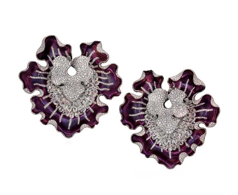Anna Hu's Magic Orchid high jewellery earrings, worn by Hilary Swank as hair ornaments to the 2011 Oscars, are made of purple titanium metal, set with 2,058 briolette, silver-grey and white diamonds.