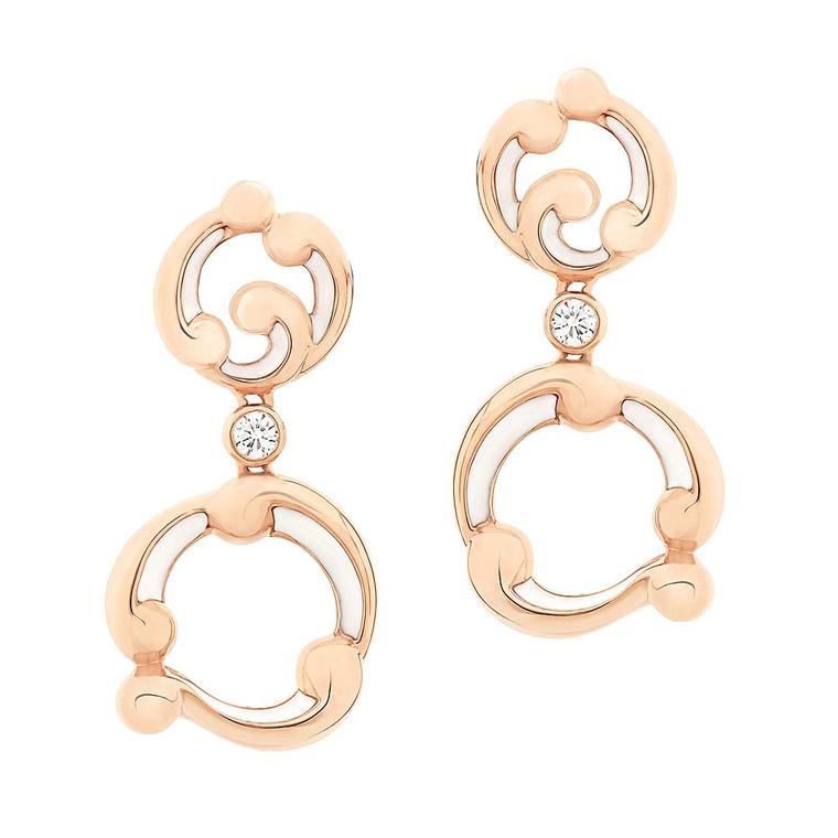 Fabergé earrings in rose gold, white enamel and diamonds from the Rococo fine jewellery collection, inspired by the gold scrolls that featured on the Fabergé Rocaille Easter egg.