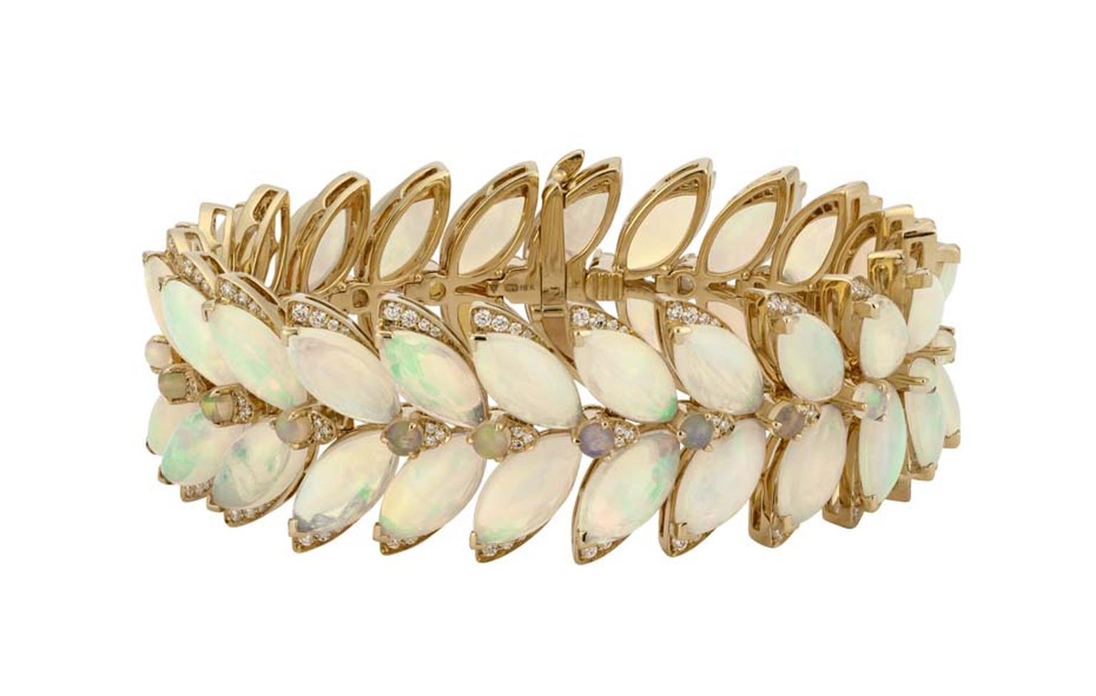 Stephen Webster Magnipheasant Feathers white opal bracelet in yellow gold with diamonds.
