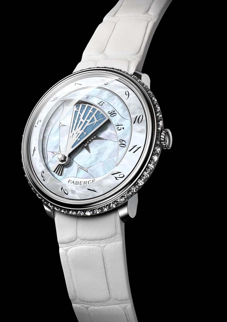 Fabergé's Winter watch, from its new Lady Compliquée collection, pays homage to the famous Fabergé Winter Egg of 1913. The unfolding fan of frost, complete with a blue enamel sky background, covers the dial on the hour and retreats again to reveal the cra